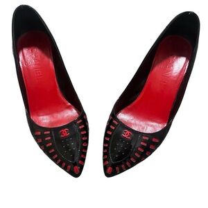 CHANEL Black Leather Pointed Pumps with Red Accents
